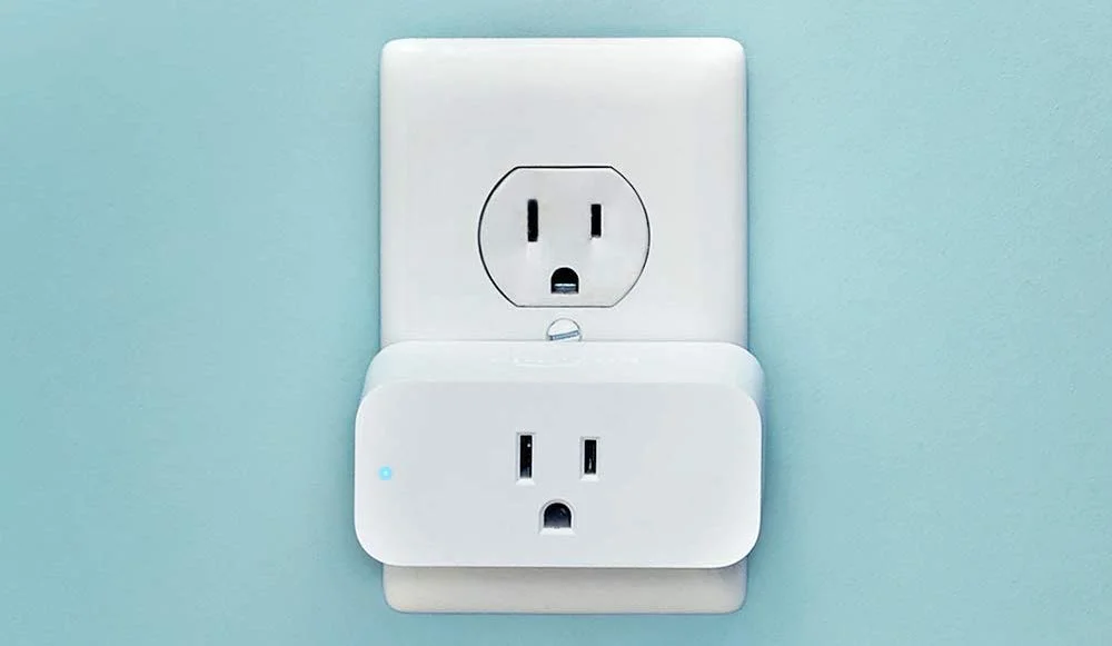 Smart plug connected to a wall outlet